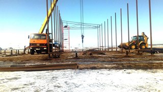 Аренда экскаватора погрузчика с ямобуром в Североморск цена от 1562 руб